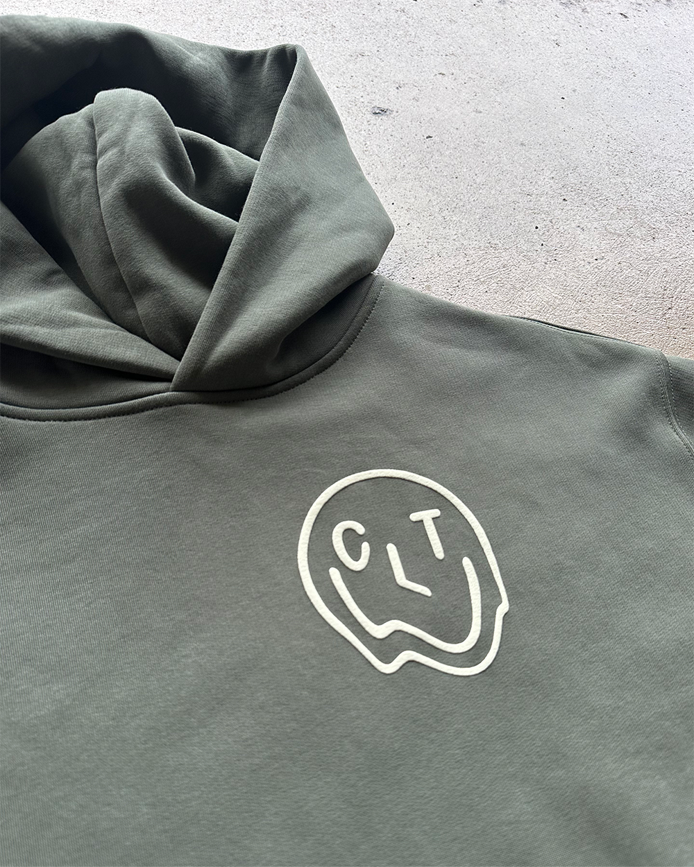 Glory Days Apparel - Melty CLT Smiley Relaxed Fit Hoodie
