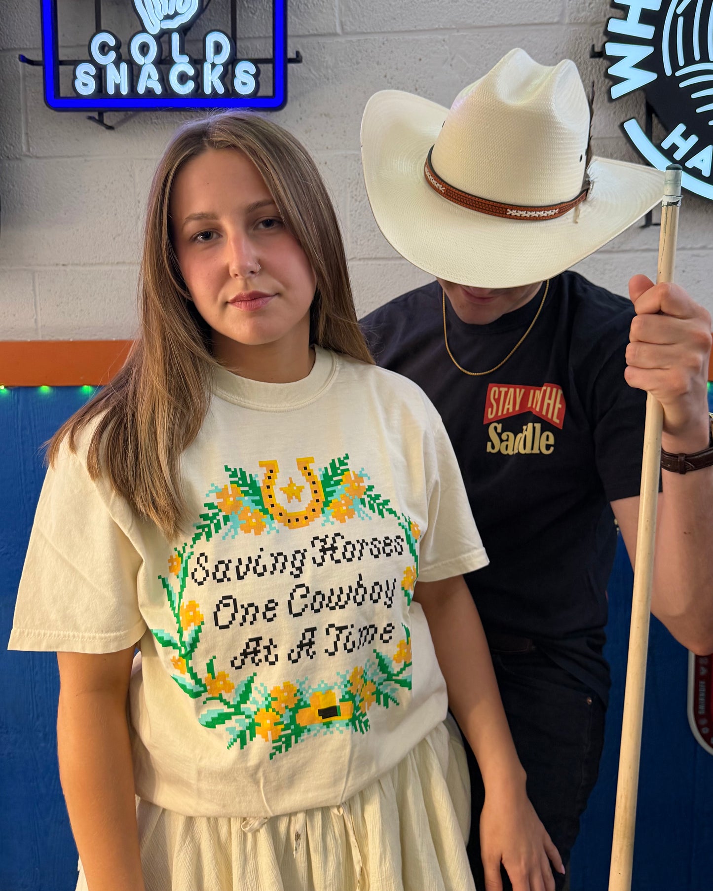 Glory Days Apparel - Cross Stitch Saving Horses One Cowboy At A Time T-Shirt