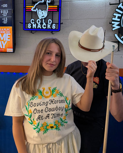 Glory Days Apparel - Cross Stitch Saving Horses One Cowboy At A Time T-Shirt